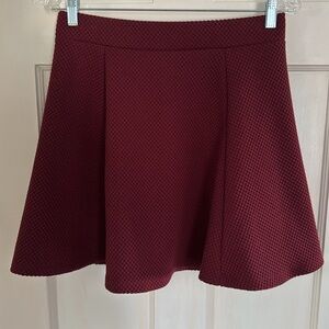 🍇 H&M Divided burgundy mini skater skirt. Size L.